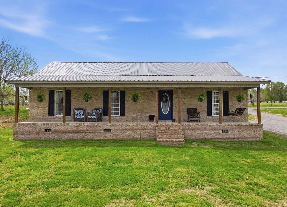 9.73 Acres of Land with Home for Sale in Huntland, Tennessee
