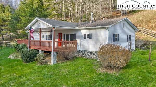 9.73 Acres of Land with Home for Sale in Creston, North Carolina