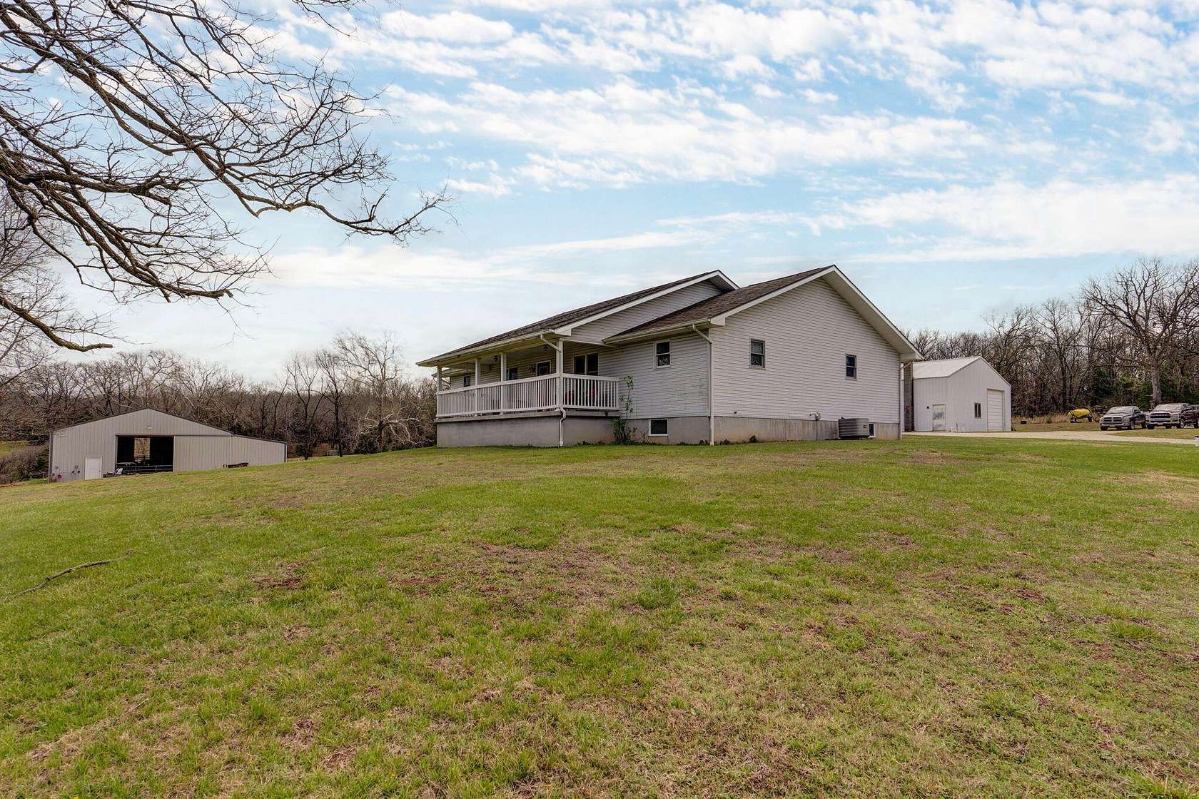 58 Acres of Land with Home for Sale in Fair Play, Missouri