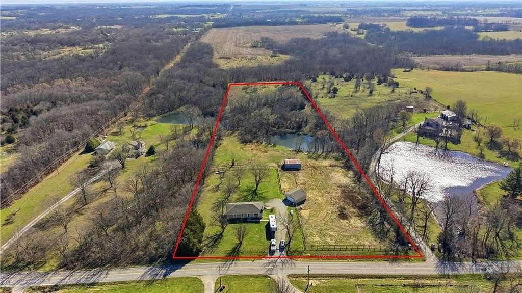 9 Acres of Land with Home for Sale in Odessa, Missouri