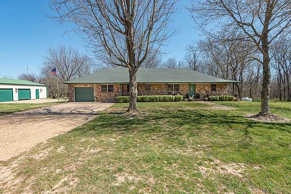 9.3 Acres of Land with Home for Sale in Bois D'Arc, Missouri