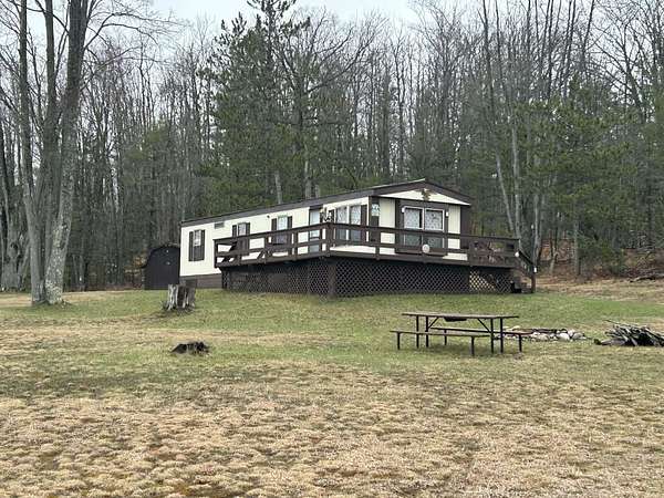 5 Acres of Land with Home for Sale in Fairview, Michigan