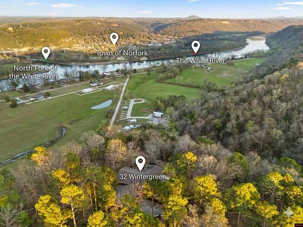 5.66 Acres of Land with Home for Sale in Norfork, Arkansas