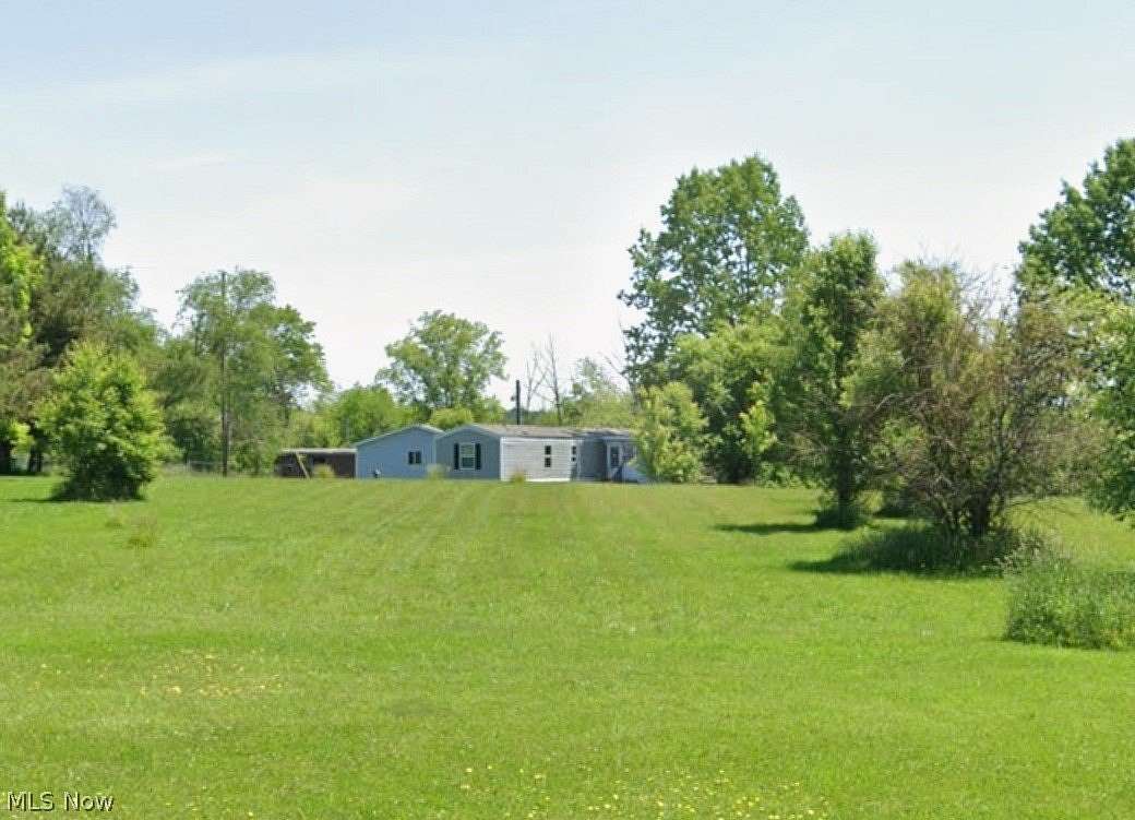 3.62 Acres of Land with Home for Sale in Homeworth, Ohio