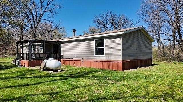 10 Acres of Land with Home for Sale in Oakgrove, Arkansas