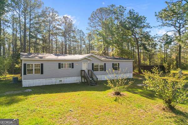 5 Acres of Land with Home for Sale in Jesup, Georgia