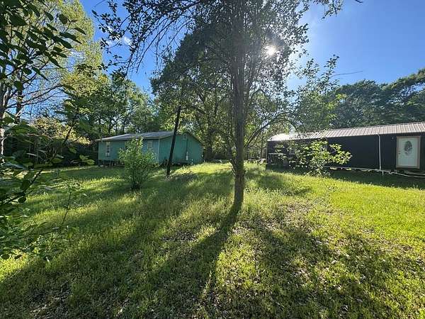 3.23 Acres of Land with Home for Sale in Colmesneil, Texas