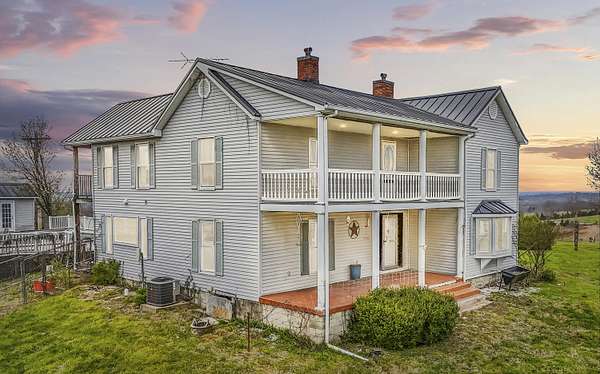 69.6 Acres of Land with Home for Sale in Berry, Kentucky