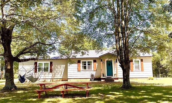 9.37 Acres of Land with Home for Sale in Hindsville, Arkansas