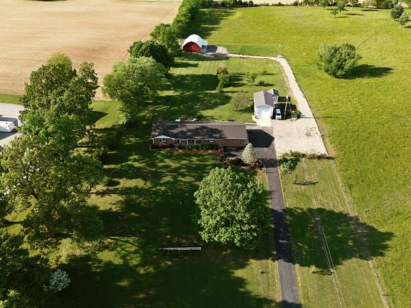 5.36 Acres of Land with Home for Sale in Cedar Hill, Tennessee
