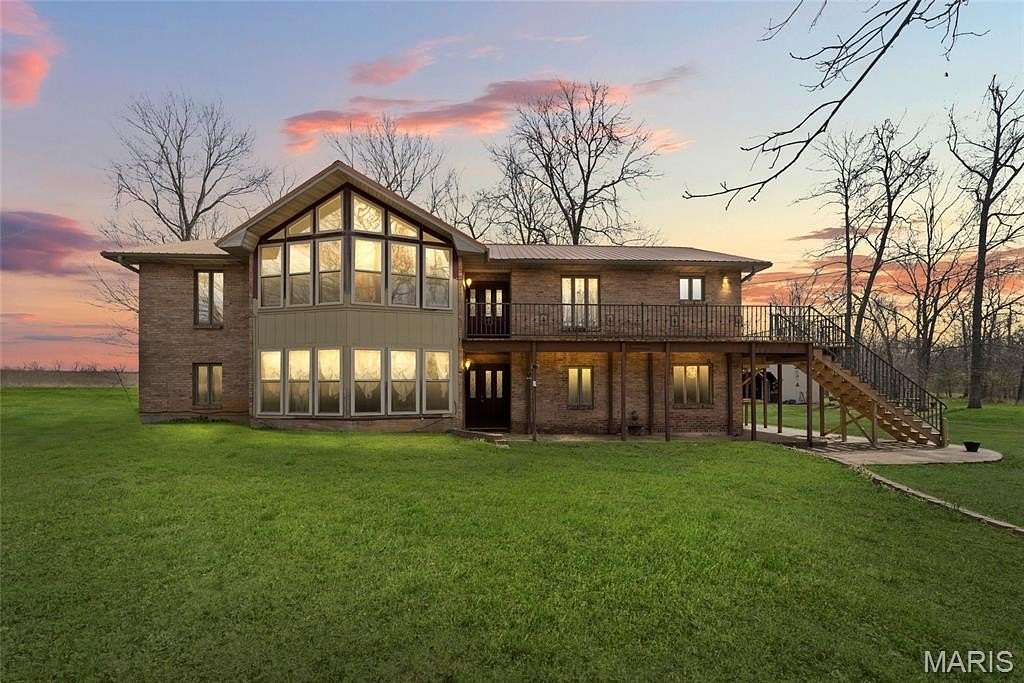 42.3 Acres of Land with Home for Sale in Farmington, Missouri