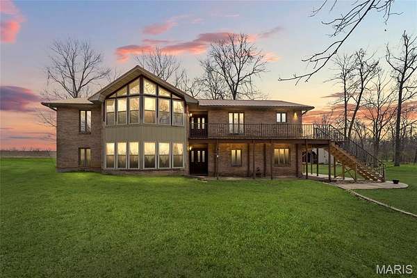 42.3 Acres of Land with Home for Sale in Farmington, Missouri