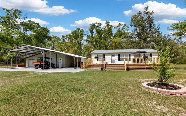 19.7 Acres of Land with Home for Sale in Live Oak, Florida