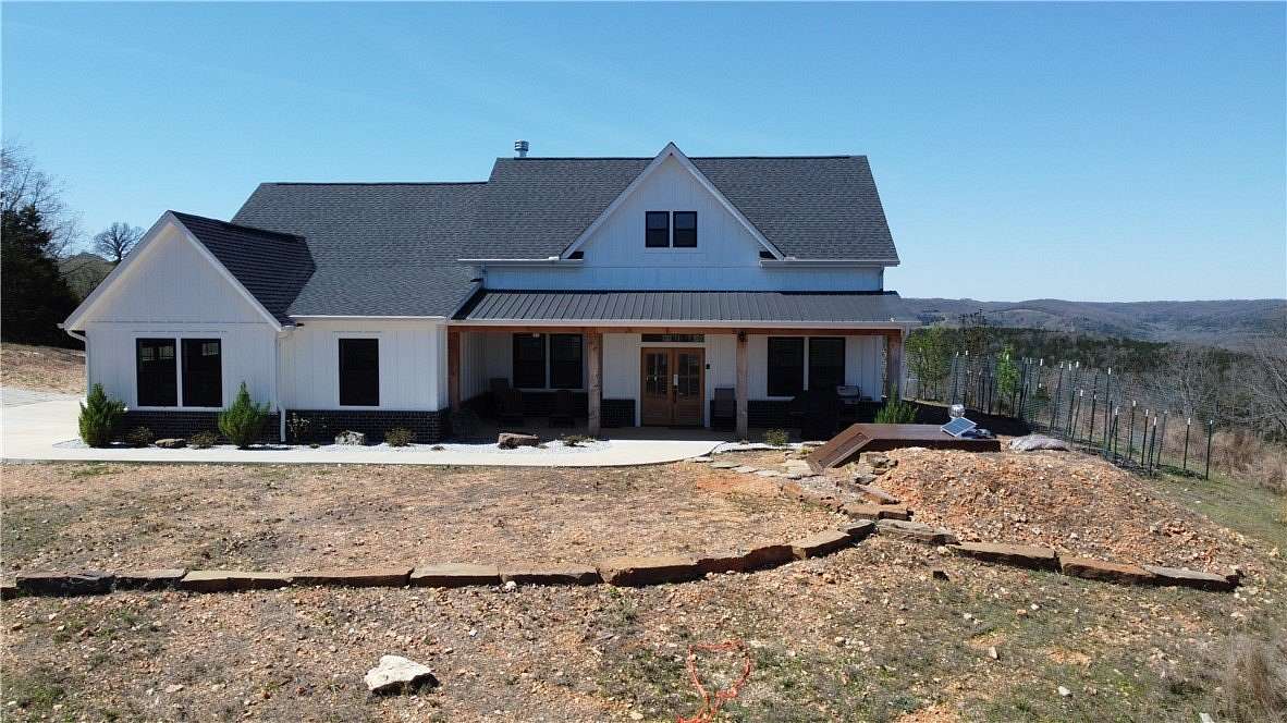 7 Acres of Land with Home for Sale in Harrison, Arkansas