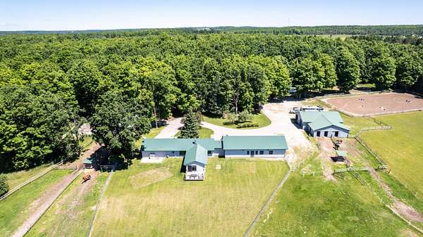 41 Acres of Land with Home for Sale in Onaway, Michigan