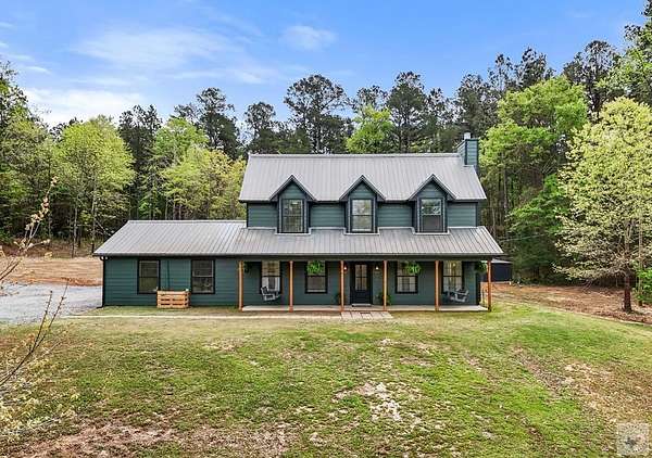 11.5 Acres of Land with Home for Sale in Atlanta, Texas