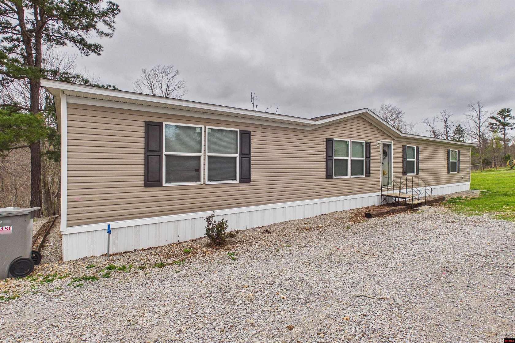 9.85 Acres of Land with Home for Sale in Yellville, Arkansas