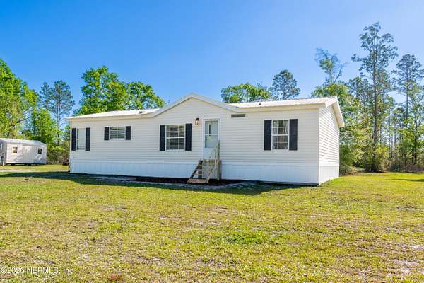 5 Acres of Land with Home for Sale in Starke, Florida