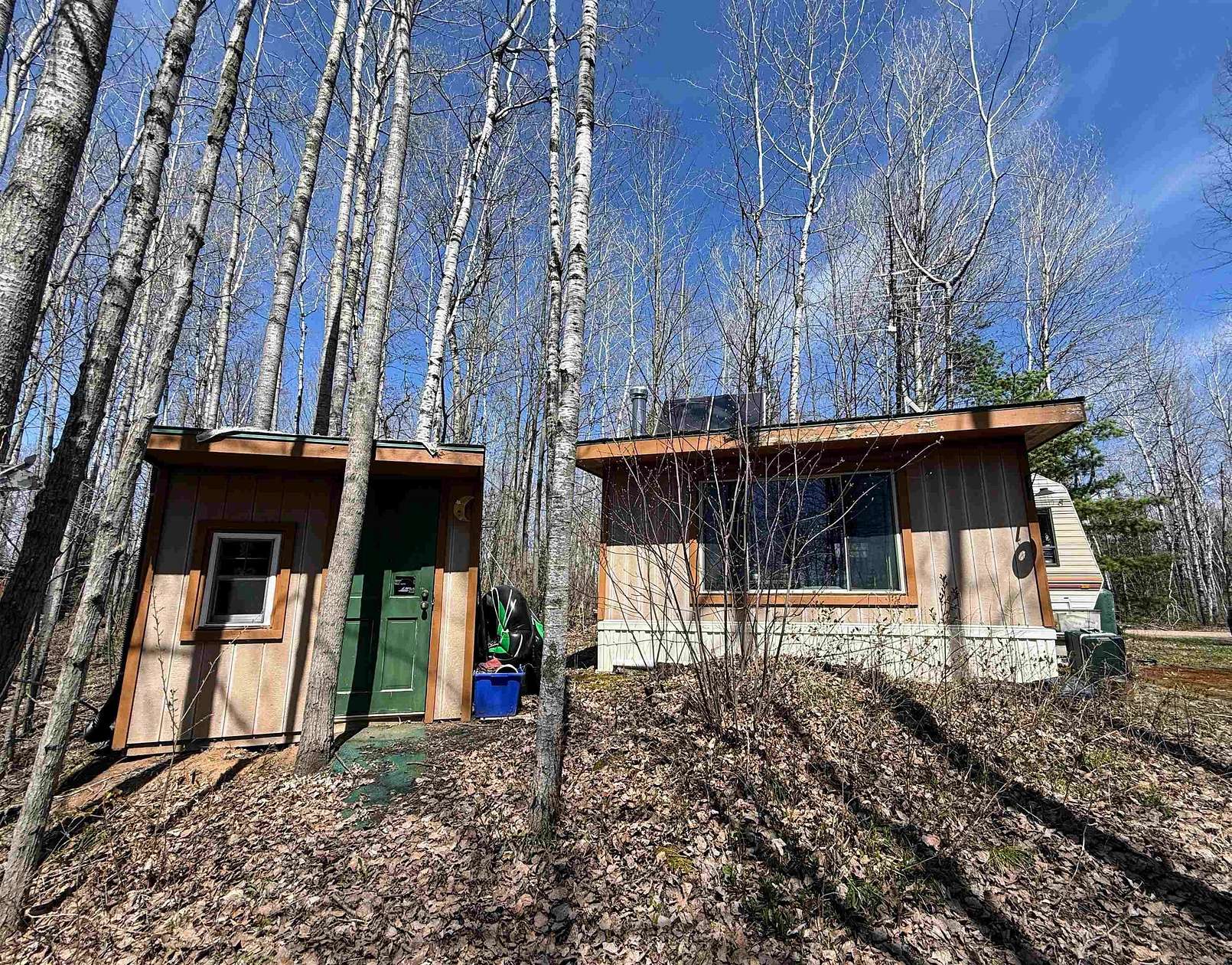 0.69 Acres of Land with Home for Sale in Park Falls, Wisconsin