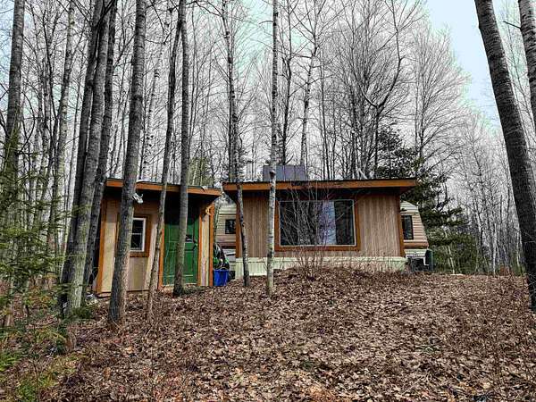 0.69 Acres of Land with Home for Sale in Park Falls, Wisconsin