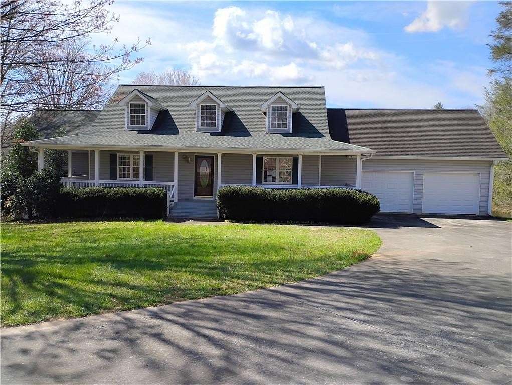 9.84 Acres of Land with Home for Sale in Ellijay, Georgia