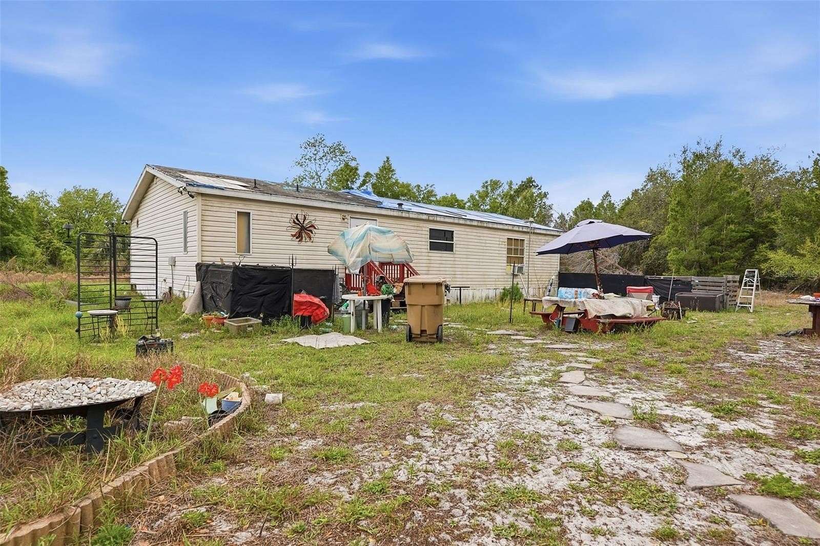 4.2 Acres of Land with Home for Sale in Eustis, Florida