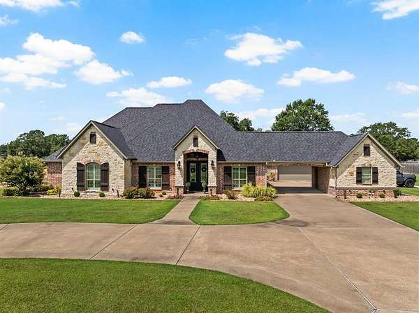 1.5 Acres of Land with Home for Sale in Pittsburg, Texas