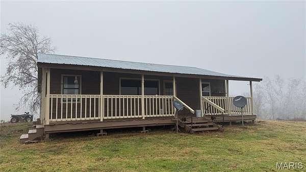 44 Acres of Agricultural Land with Home for Sale in Gatewood, Missouri