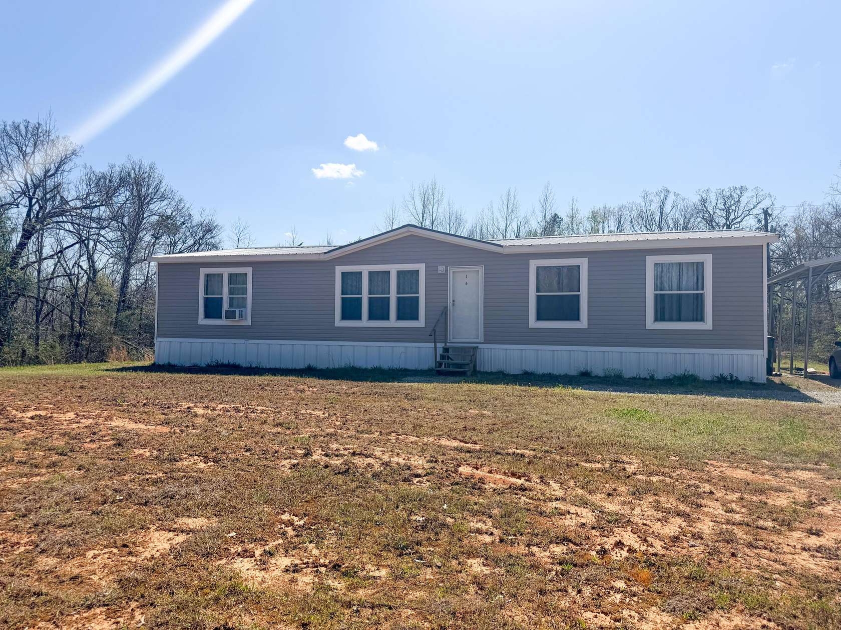 27 Acres of Land with Home for Sale in Blue Mountain, Mississippi