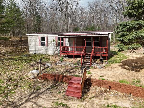 15.5 Acres of Recreational Land with Home for Sale in Wellston, Michigan