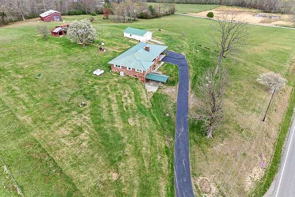 21.1 Acres of Recreational Land with Home for Sale in Pikeville, Tennessee