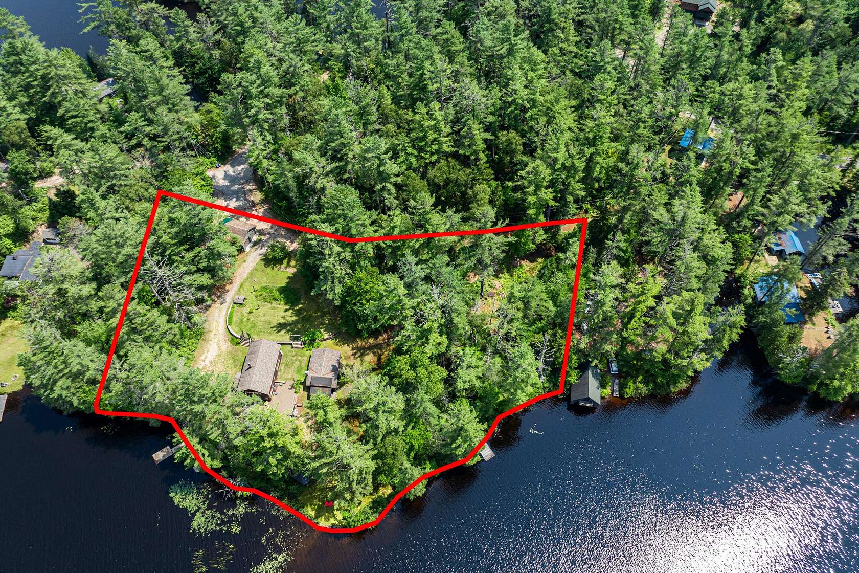 1.6 Acres of Land with Home for Sale in Rainbow Lake, New York