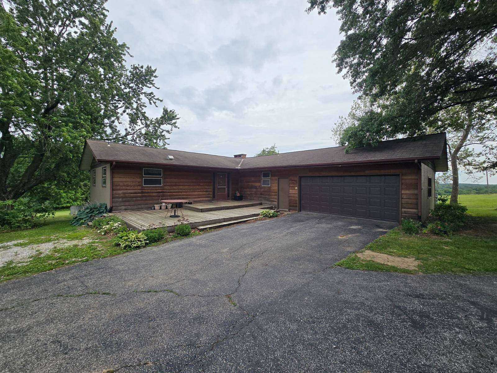 24.8 Acres of Land with Home for Sale in Colchester, Illinois