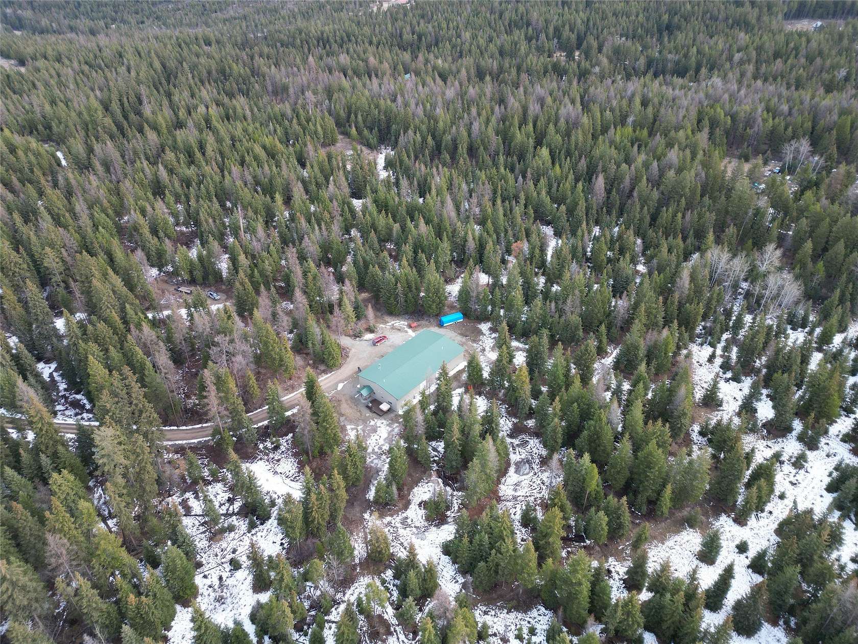 56.6 Acres of Recreational Land with Home for Sale in Kila, Montana