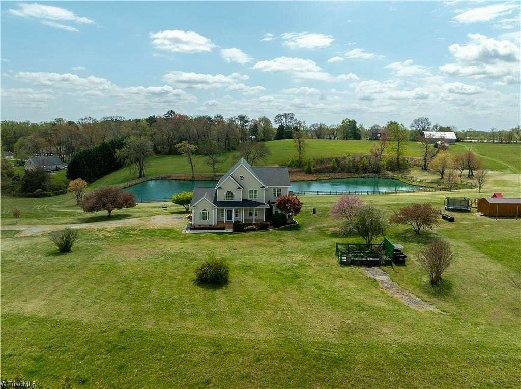 22.9 Acres of Recreational Land with Home for Sale in Boonville, North Carolina