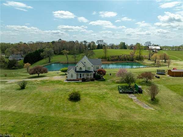 22.9 Acres of Recreational Land with Home for Sale in Boonville, North Carolina