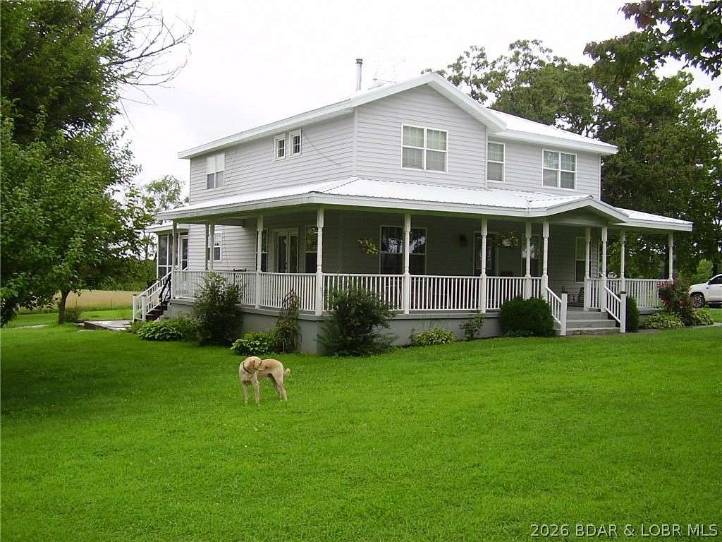 40 Acres of Land with Home for Sale in Louisburg, Missouri