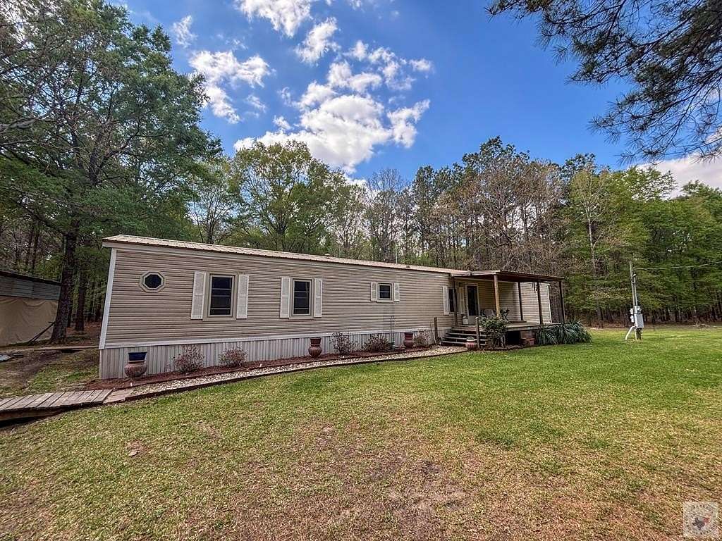 5 Acres of Land with Home for Sale in Hooks, Texas