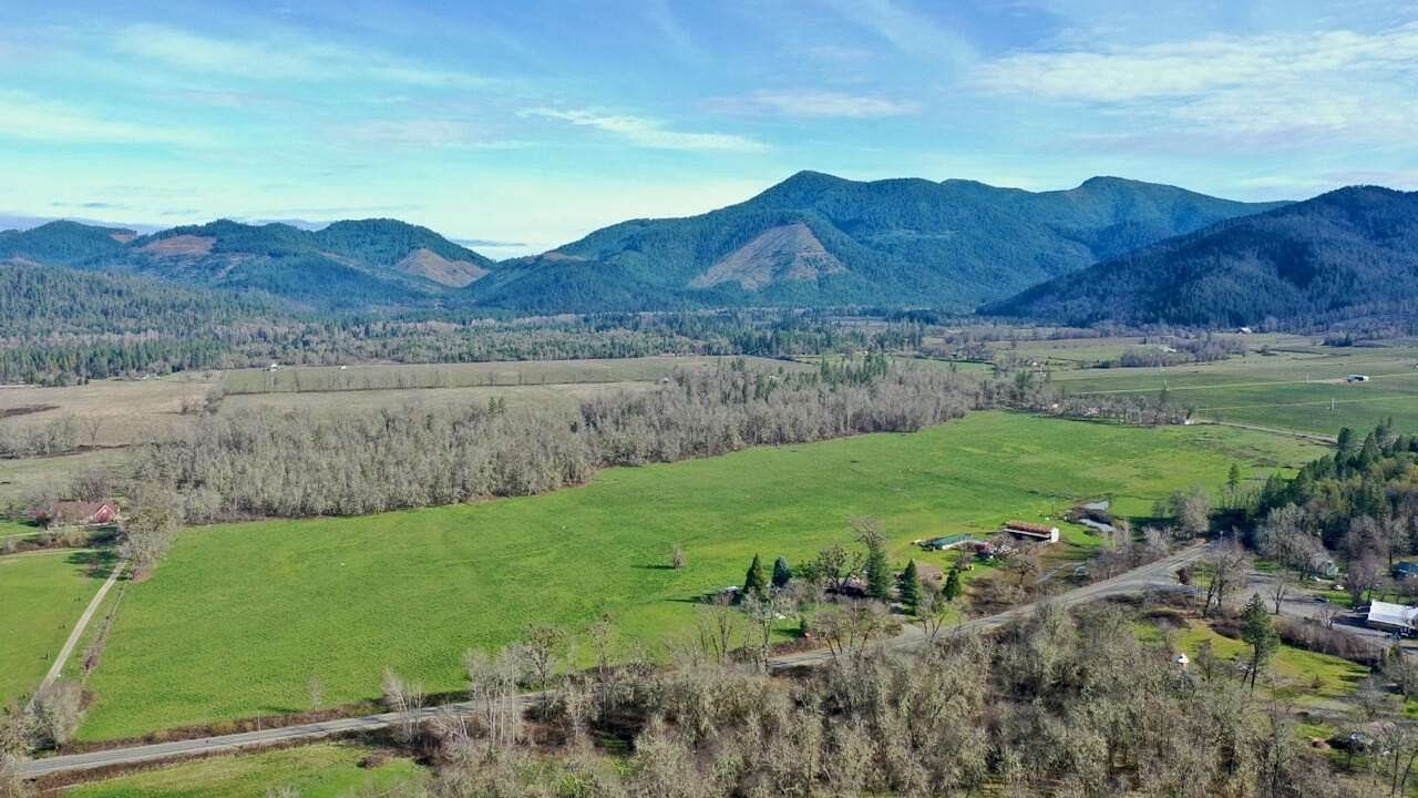 102 Acres of Agricultural Land with Home for Sale in Cave Junction, Oregon