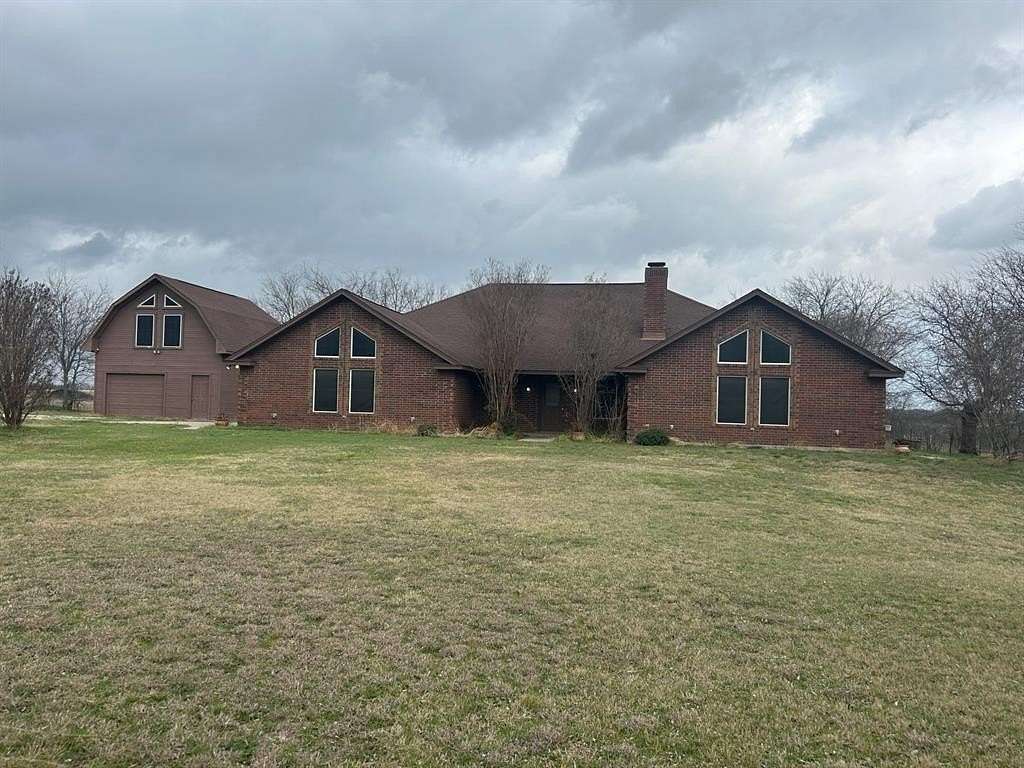 11.2 Acres of Land with Home for Sale in Decatur, Texas