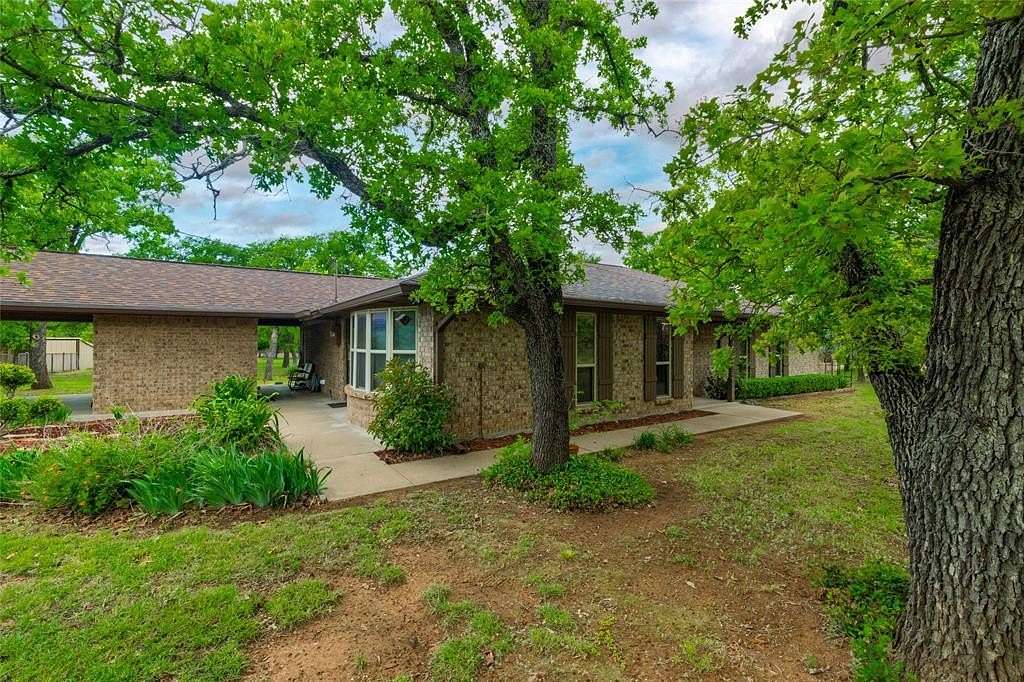 20 Acres of Land with Home for Sale in Santo, Texas