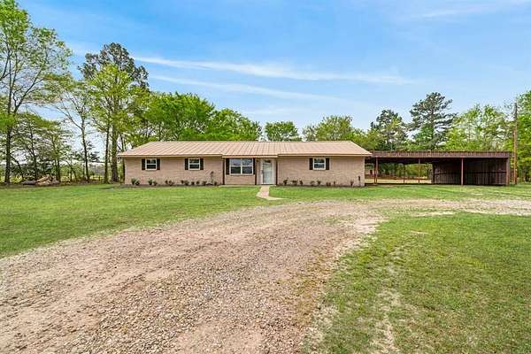 2 Acres of Land with Home for Sale in Blossom, Texas