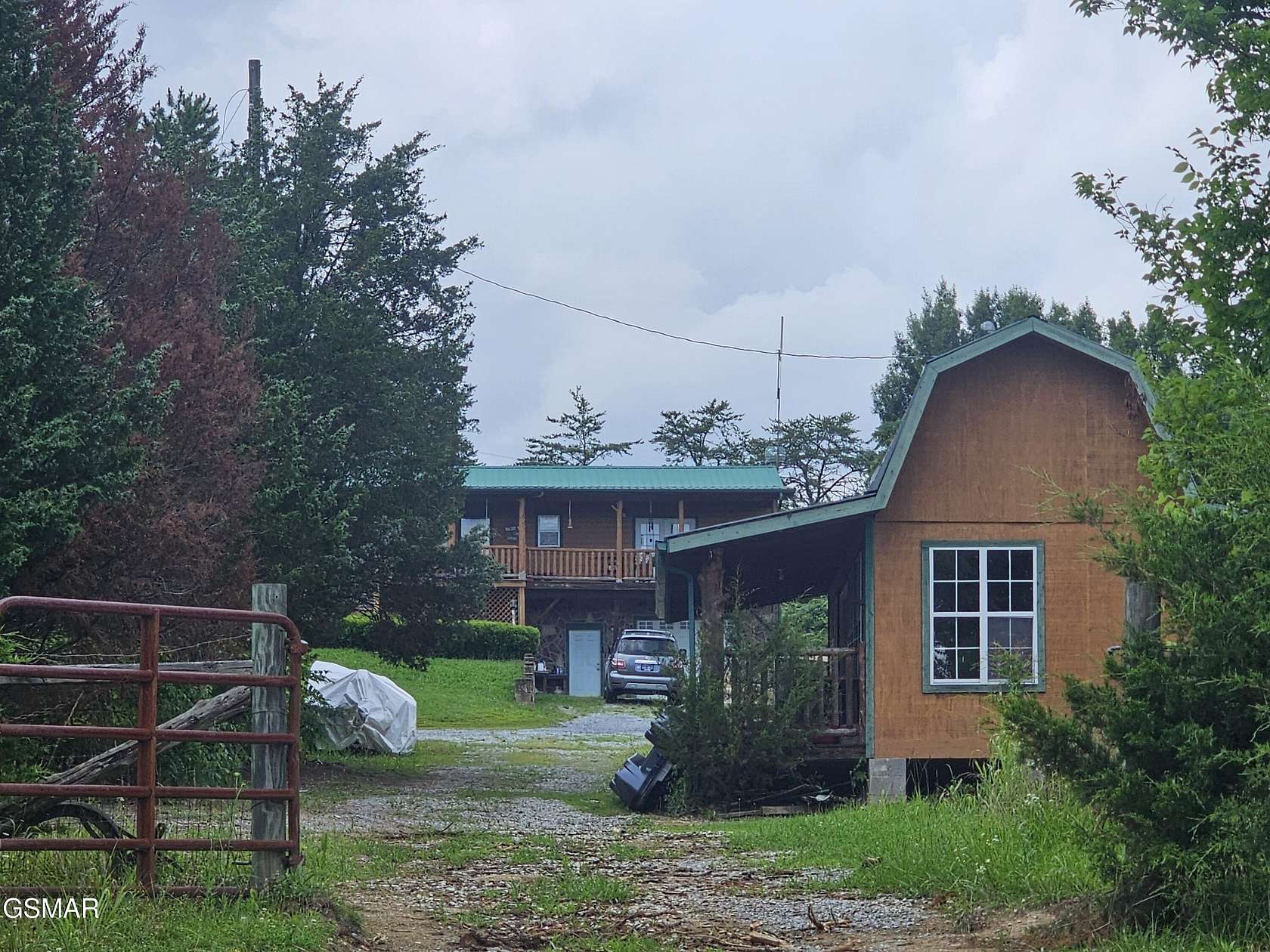 8.42 Acres of Land with Home for Sale in Sevierville, Tennessee