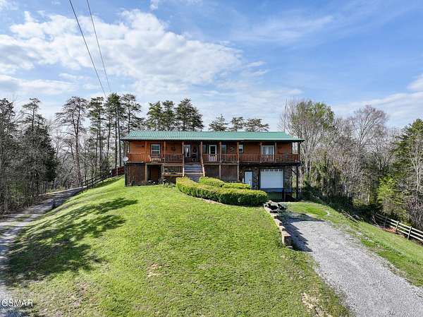 8.42 Acres of Land with Home for Sale in Sevierville, Tennessee