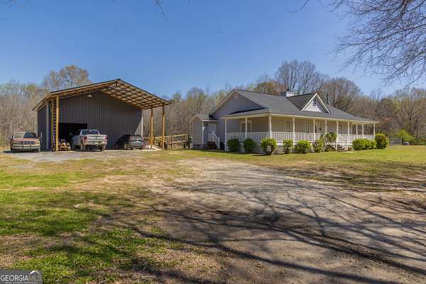 10.8 Acres of Land with Home for Sale in Meansville, Georgia