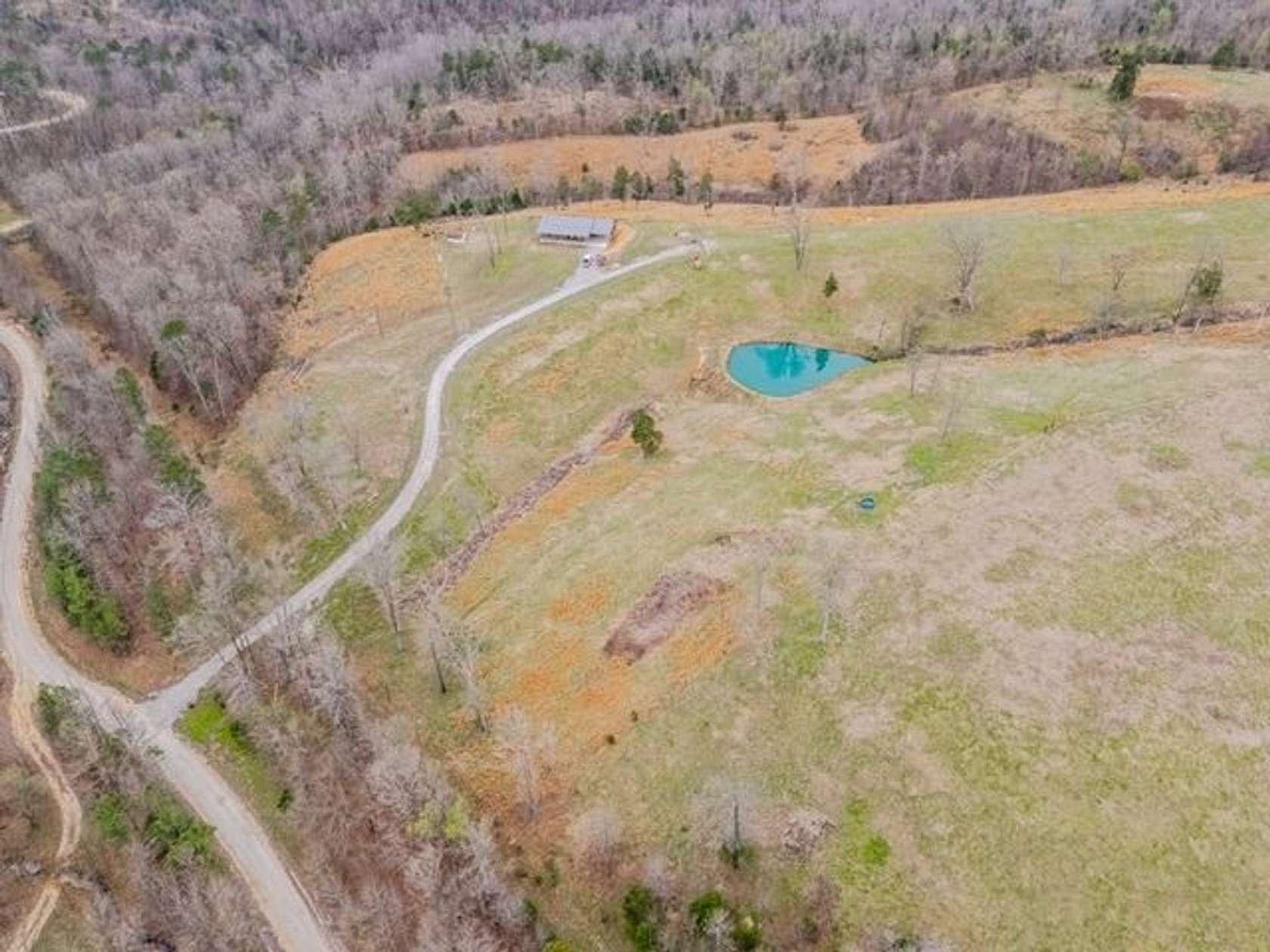 58 Acres of Land with Home for Sale in Melbourne, Arkansas