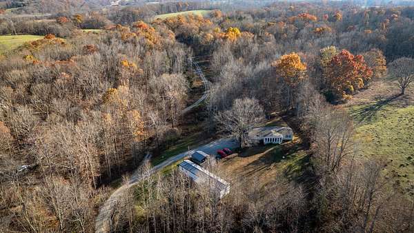 5 Acres of Land with Home for Sale in Bon Aqua, Tennessee