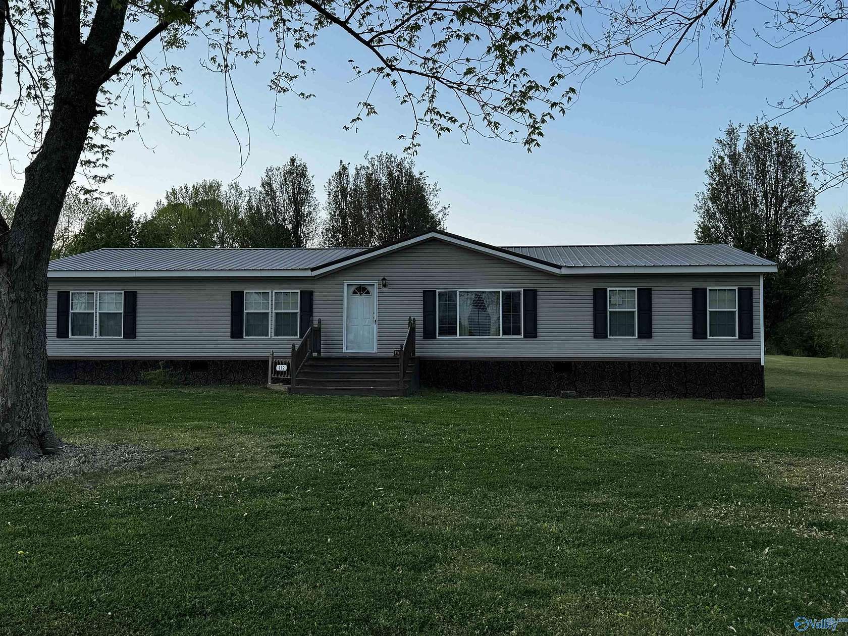 7.53 Acres of Land with Home for Sale in Arab, Alabama