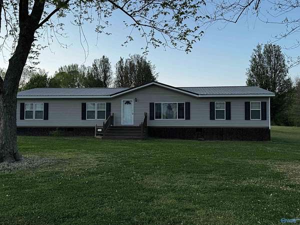 7.53 Acres of Land with Home for Sale in Arab, Alabama