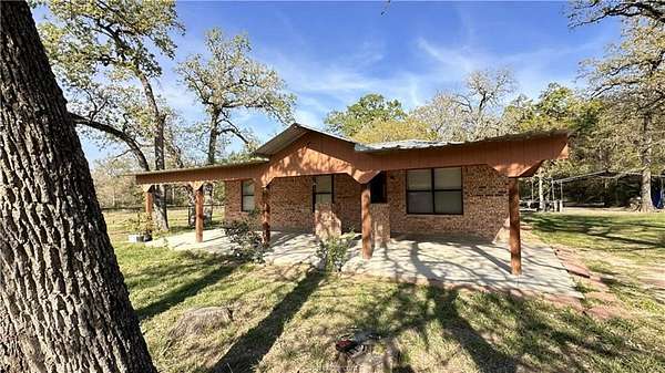 1.9 Acres of Land with Home for Sale in Madisonville, Texas